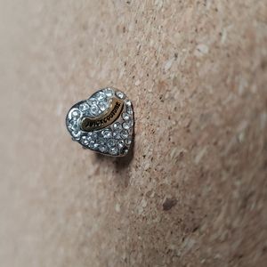 Juicy Couture earring with Juicy Couture pouch bag